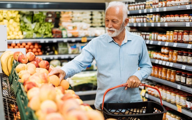 The essence of exceptional living a person holding a shopping cart in a grocery store
