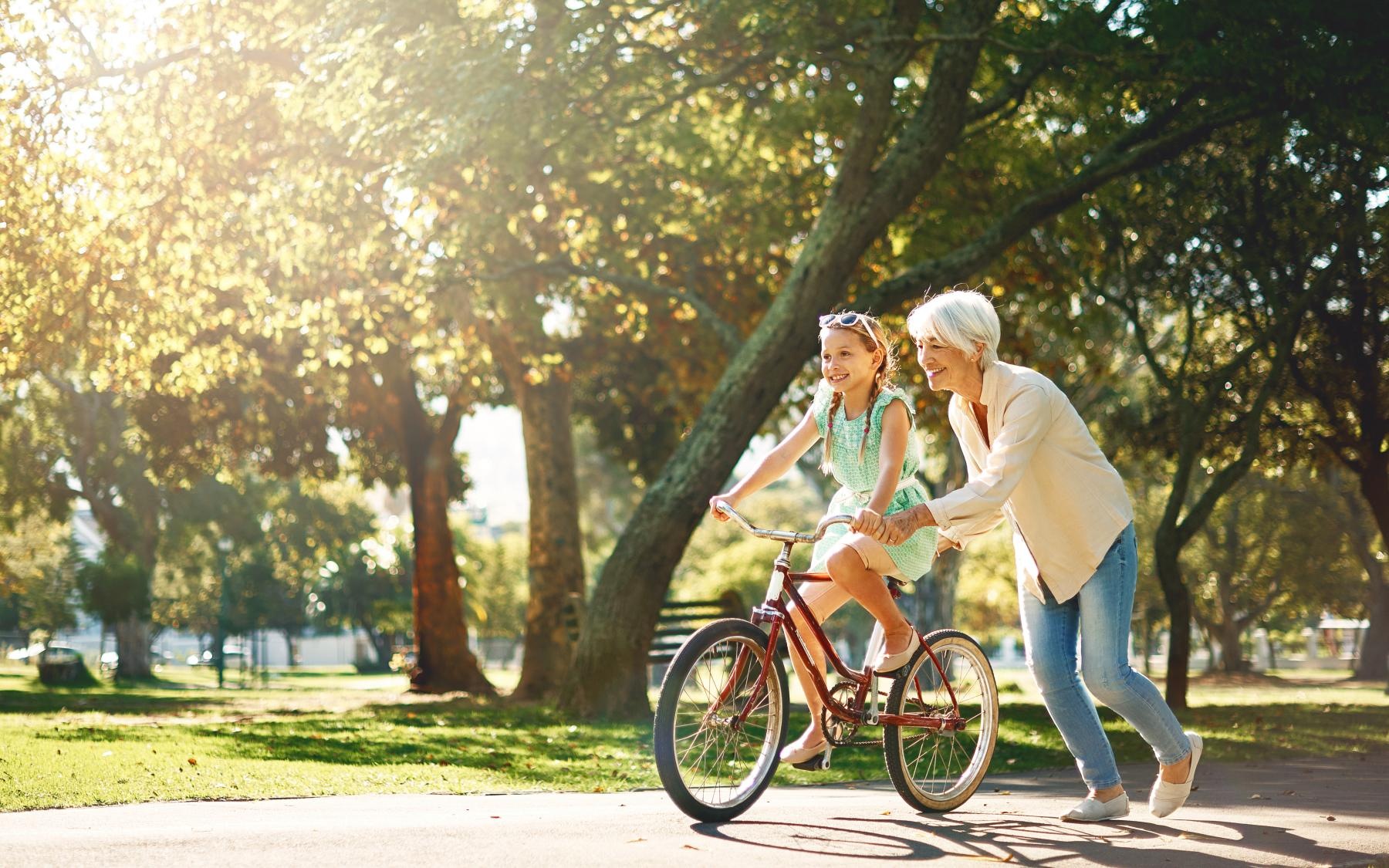 Lifestyle Grand daughter and grandma out riding bikes