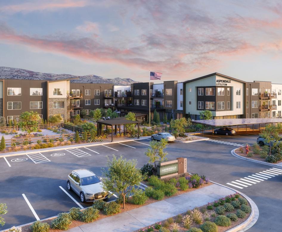 a parking lot with cars and buildings