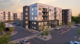 exterior of a building with a large parking lot and cars