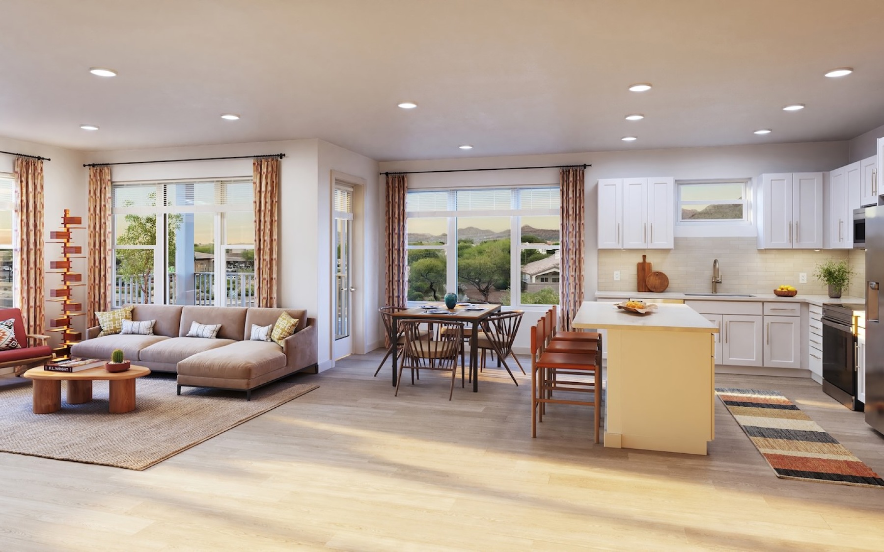 Apartment with an open concept floor plan at Aspendale Scottsdale in Scottsdale, AZ, featuring a kitchen and living room.