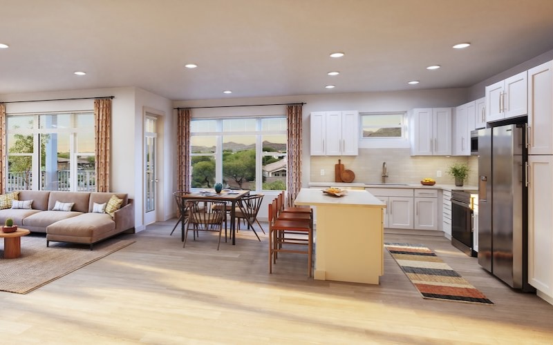 Apartment with an open concept floor plan at Aspendale Scottsdale in Scottsdale, AZ, featuring a kitchen and living room.