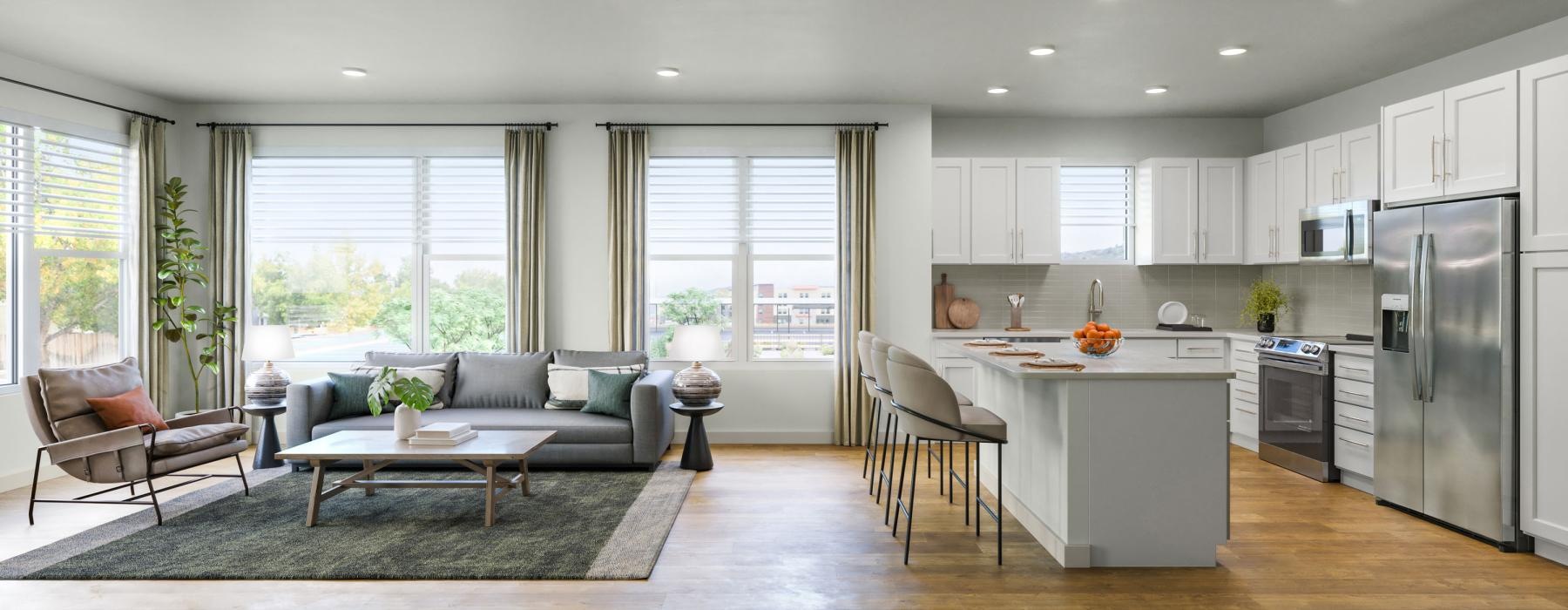 a large kitchen with a couch and a table