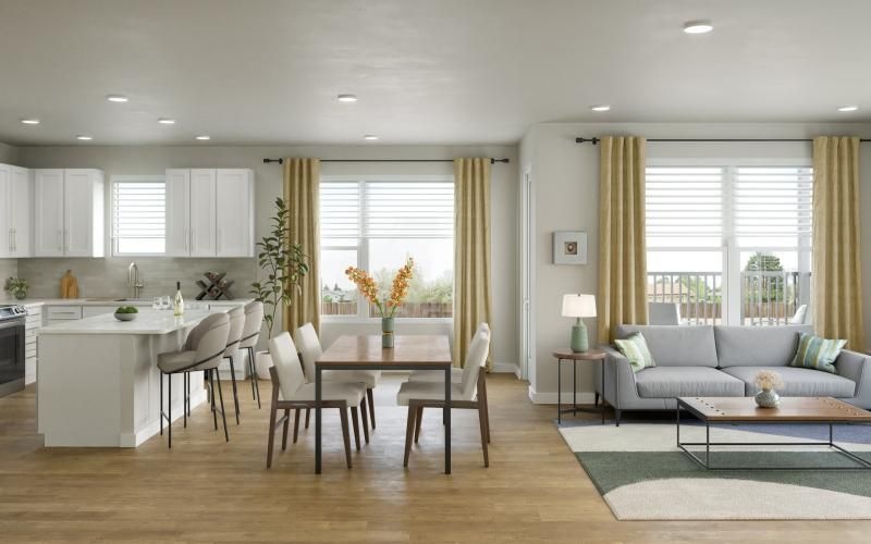 Large living room with wood floors and large windows