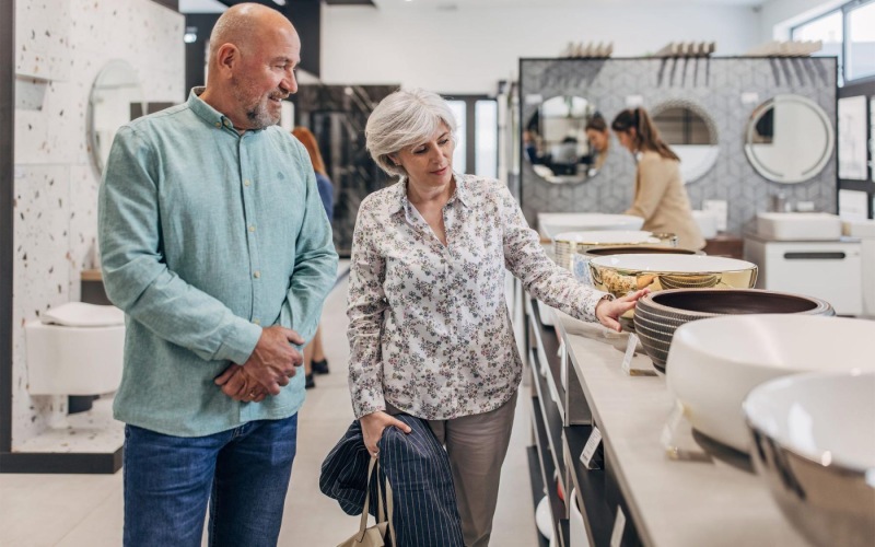 A beautiful community at the heart of all your passions a man and woman shopping for dishes