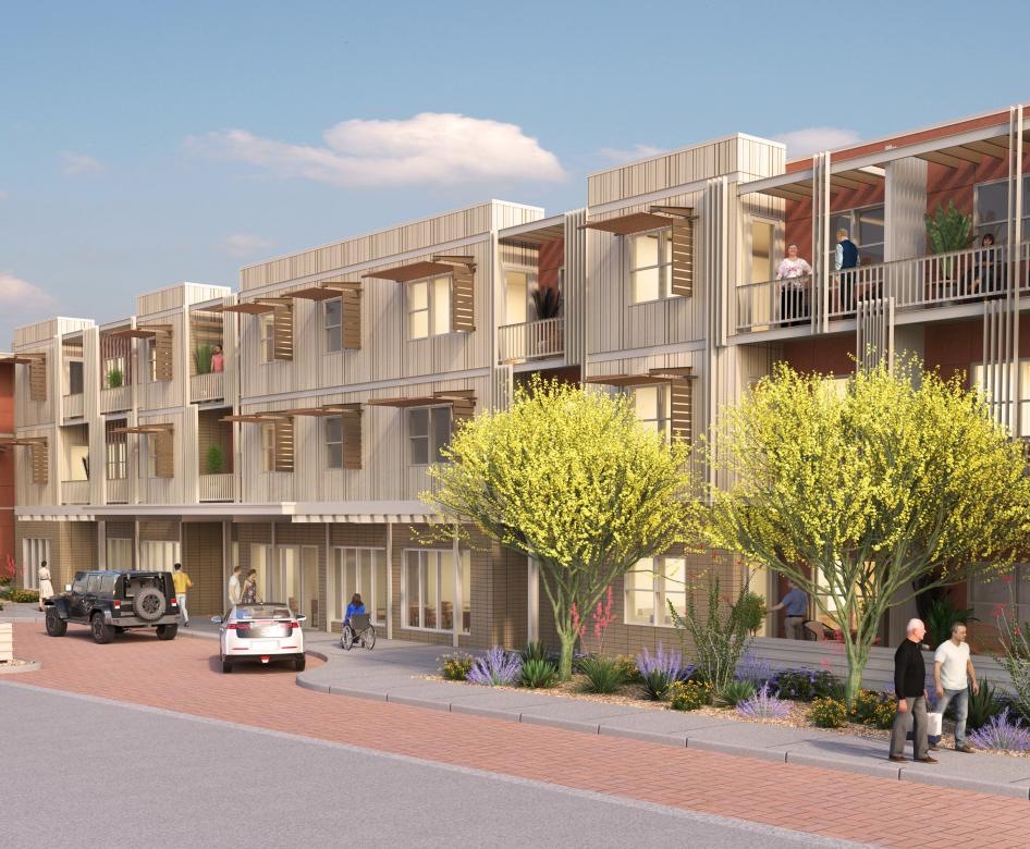 a building with cars and people outside