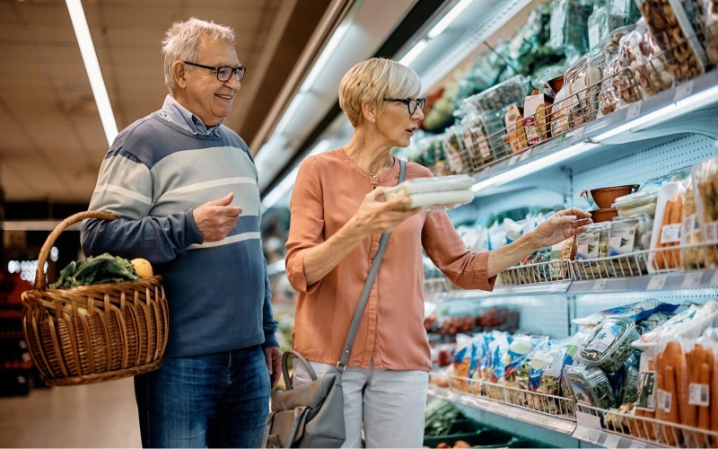 Find your perfect fit at Aspendale Northglenn a man and woman grocery shopping