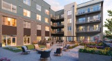 Large courtyard with seating and a firepit